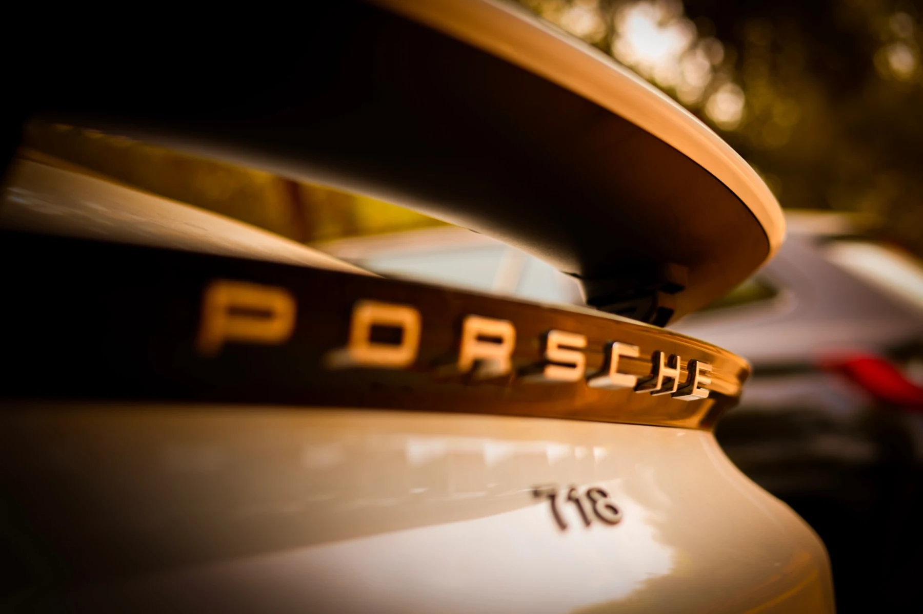 Porsche lettering and 718 badge detail
