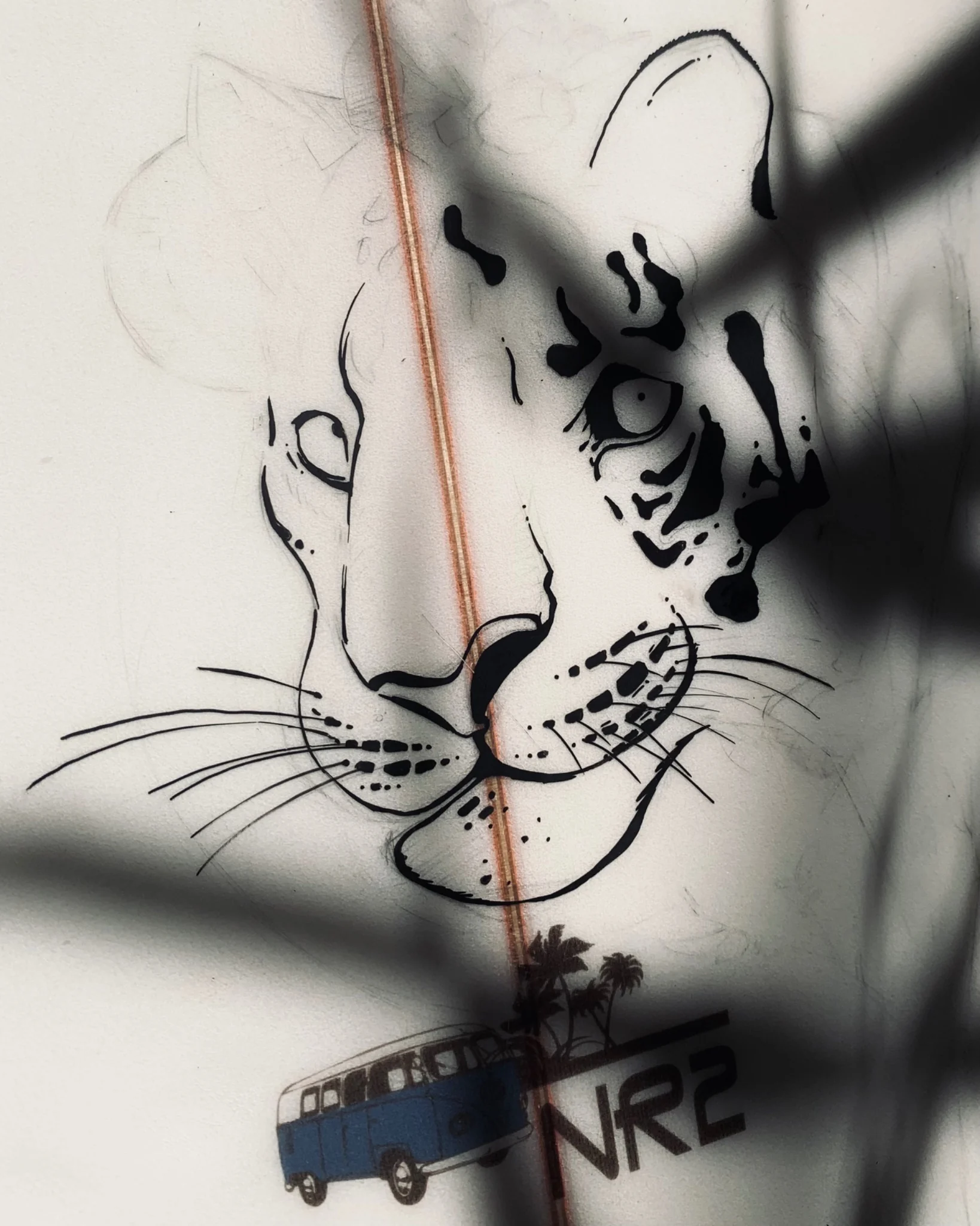 Surfboard graphic study with hand-drawn animal illustration